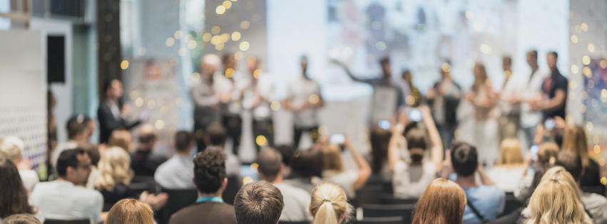 Award ceremony in front of a large audience