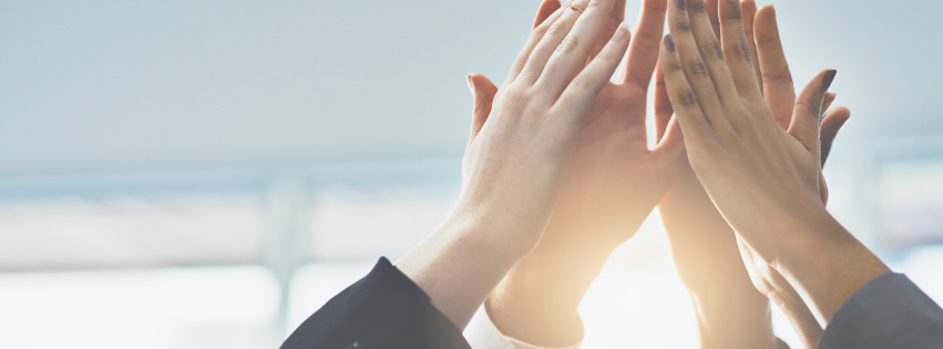 People giving a high five