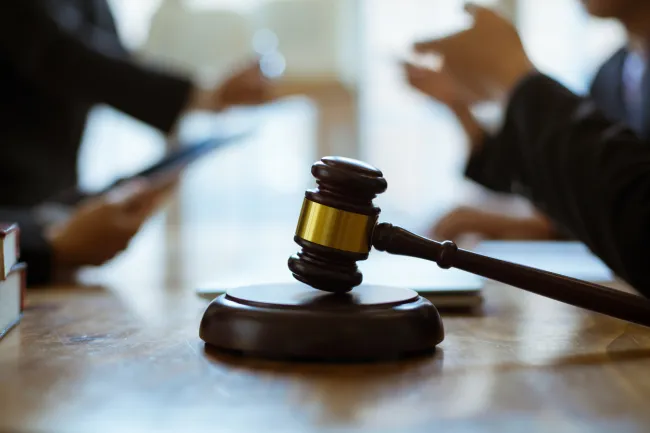 Gavel, book and lady justice